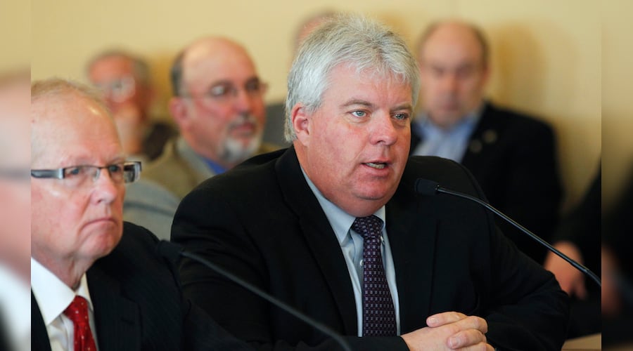 (Al Hartmann  |  Tribune file photo) In 2013, Don Peay of Sportsmen for Fish and Wildlife, right, spoke before the House Natural Resources, Agriculture, and Environment Committee. Peay was affiliated with Big Game Forever, an anti-wolf advocacy group, which was seeking $300,000 from the Utah Legislature that year.